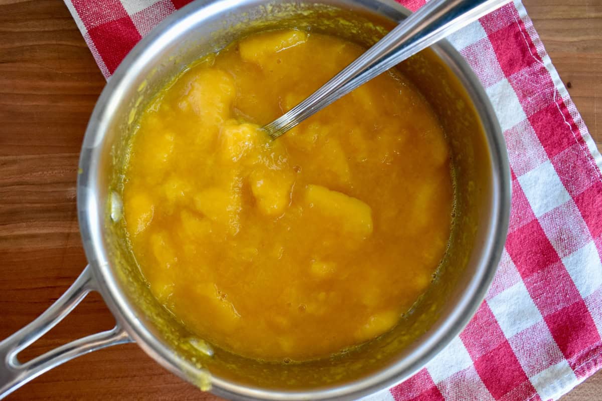 Mangoes in a saucepan. 