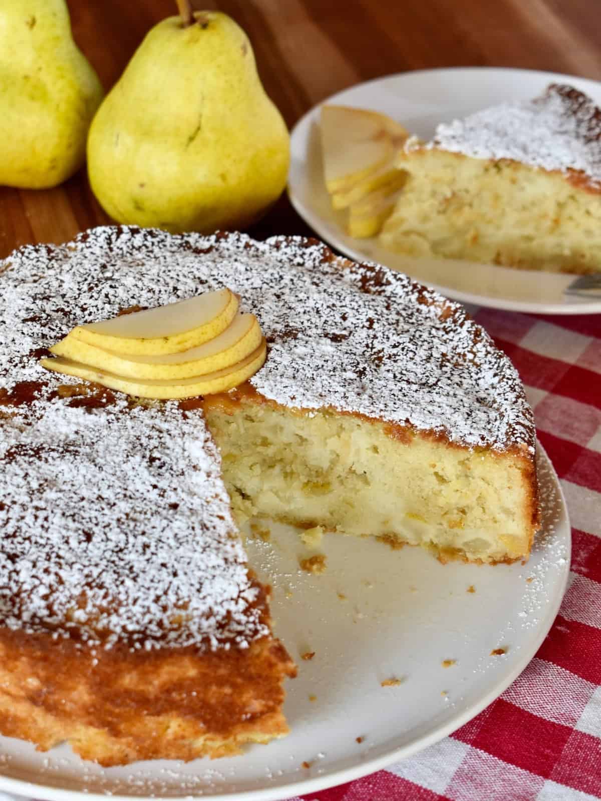 Pear Ricotta Cake on a white plate. 