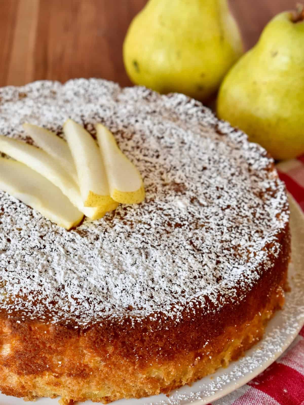 Pear Ricotta Cake on a white plate. 