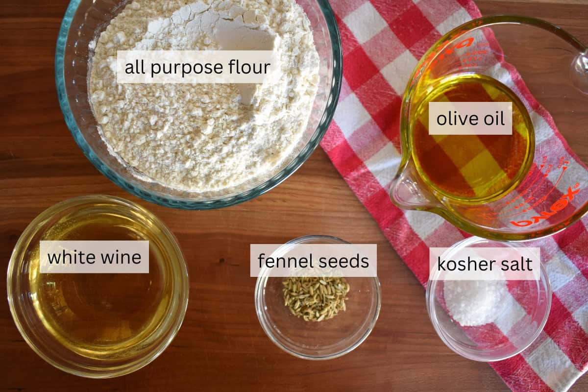 Ingredients for recipe include flour, olive oil, salt, fennel seeds, and white wine. 